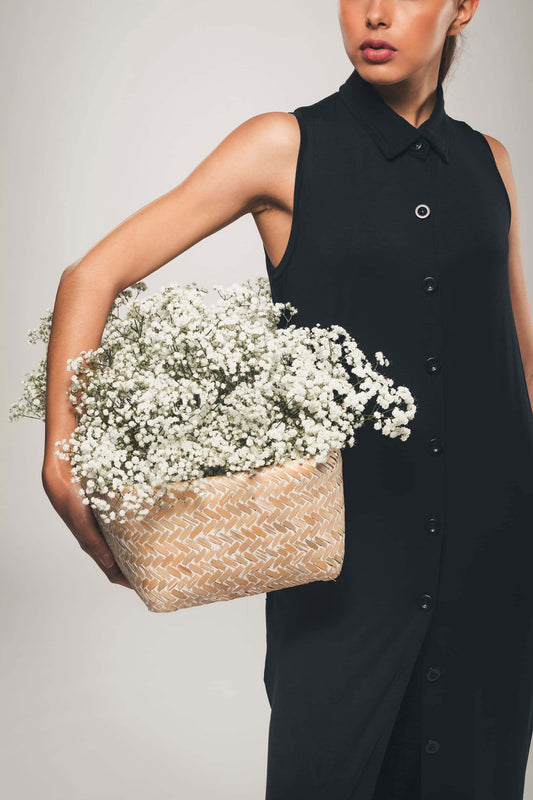 Image of black sleeveless lyocell maxi shirt dress made by Organique, a sustainable clothing brand.