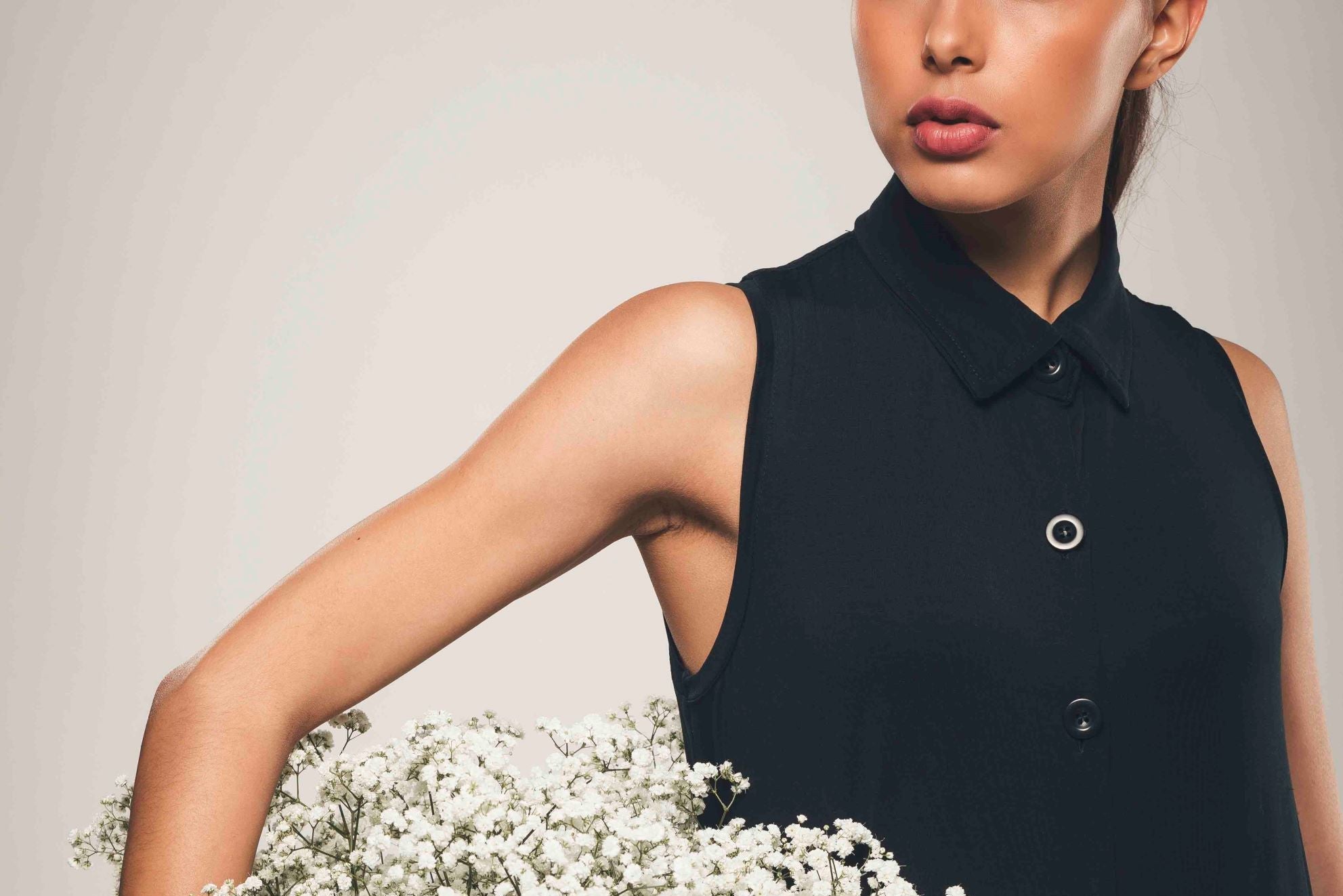 women wearing a black shirt dress made of lyocell