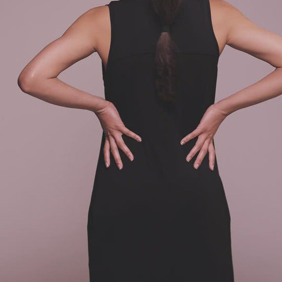 Video of Lyocell  black sleeveless dress made by Organique, a sustainable clothing brand.