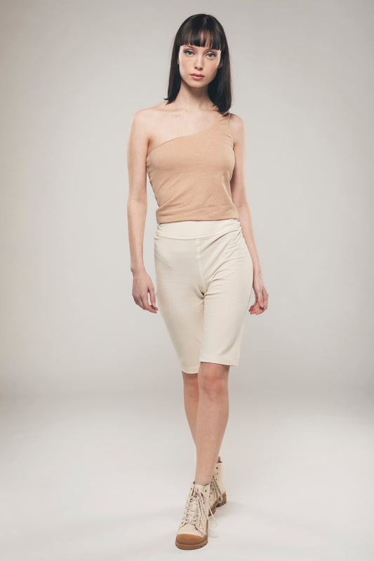 Image of organic cycling shorts in ecru made by Organique, a sustainable fashion brand.