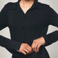 Imagen de los detalles del maxi vestido camisero negro de lyocell orgánico de Organique.
