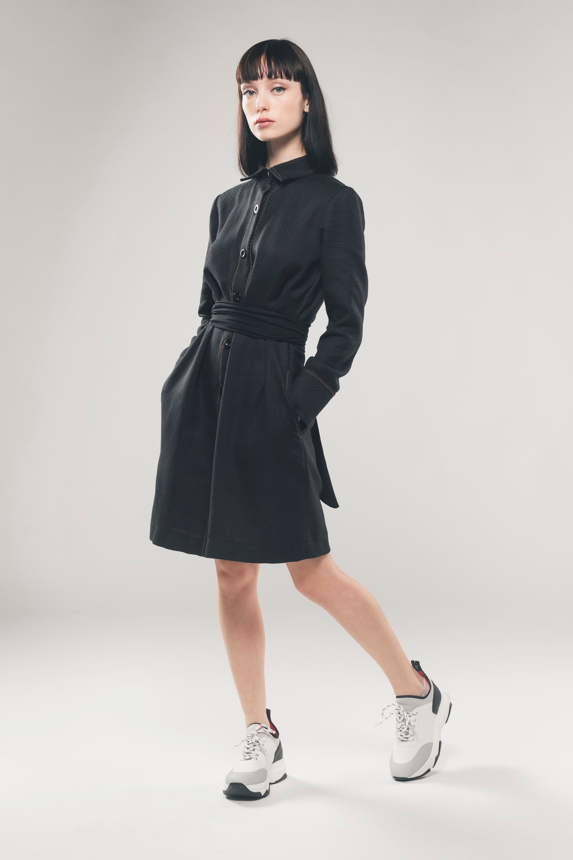 Image of organic cotton shirt dress in black made by Organique, a sustainable clothing brand.